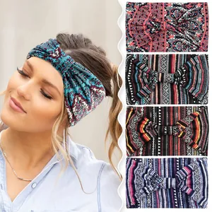 Detail of four bohemian leopard print elastic headbands showing different colors and patterns