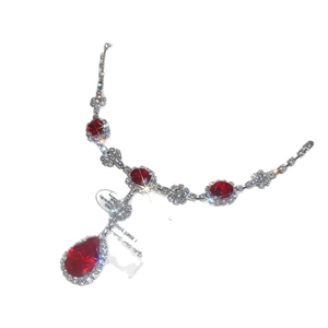 Elegant French vintage necklace with red pear-cut crystals and sparkling diamond accents