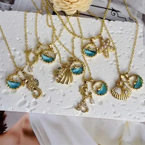 18K gold plated ocean necklaces featuring seahorse and starfish pendants with sparkling zircons