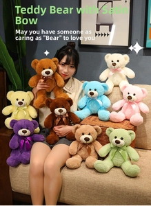 Detail showing plush teddy bears in multiple colors with satin bows on a cozy sofa