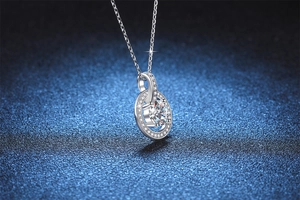 Macro shot of S925 sterling silver necklace with a brilliant 1-carat moissanite pendant
