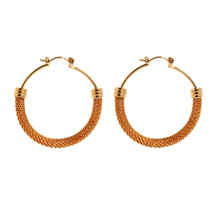 Exaggerated golden woven mesh hoop earrings with a large round circular design