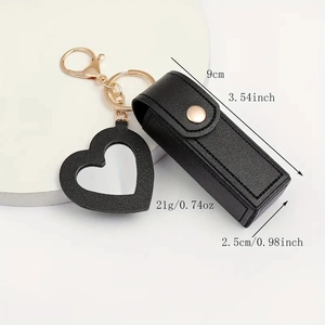 Detail view of black PU leather lipstick holder keychain with size and weight dimensions