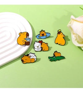Detailed set of six cute enamel pins featuring Capybara and crocodile for backpacks