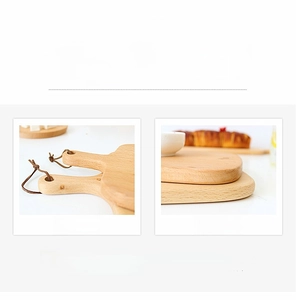 Close-up of rounded edges and leather hanging hole on natural beech wood cutting board