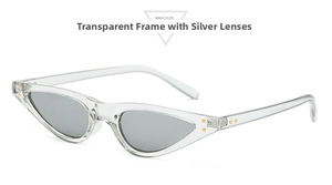 Detailed view of cat eye sunglasses featuring transparent frames and silver mirror lenses