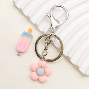 Pink resin flower and blue gradient popsicle charms for cute DIY keychain making