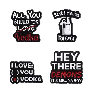 Set of minimalist metal enamel pins with witty Best Friends and Vodka quotes
