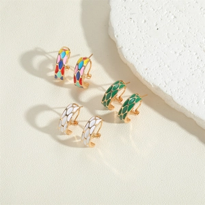 Three pairs of French vintage enamel heart earrings with 14K gold plating on textured stone