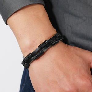 Men's minimalist multi-layer black braided leather bracelet with a magnetic clasp