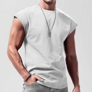 Detailed texture of white cotton muscle tank top fabric on male model in studio