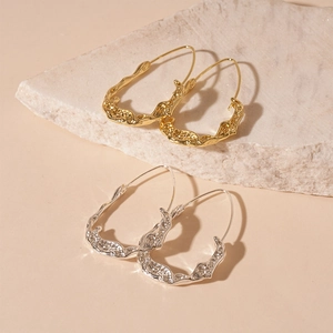 Minimalist irregular lava texture hoop earrings in gold and silver finish for women