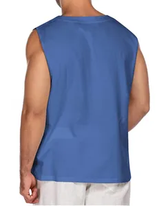 Detail view of the breathable cotton linen fabric and clean back cut on a blue tank top