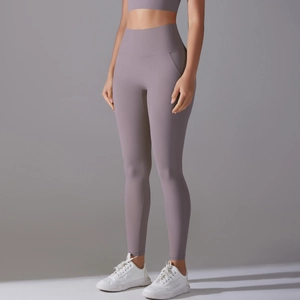 Detail view of the wide high-waisted band on Morandi purple high-elasticity yoga leggings