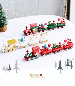 Detailed view of colorful wooden Christmas trains with Santa, snowman and bear figurines