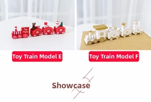 Detailed comparison of red and gold wooden Christmas trains with snowmen and bears