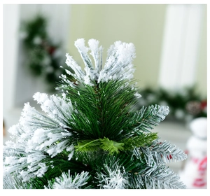 Detail of 60cm mini Christmas tree with realistic flocked pine needles and faux snow