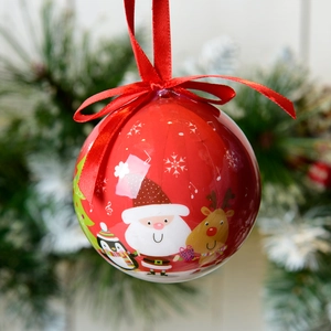 Close-up of a 7cm red Christmas foam ball with Santa Claus and reindeer illustrations