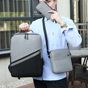 Three-piece grey Oxford cloth business backpack set with USB charging port and crossbody bag