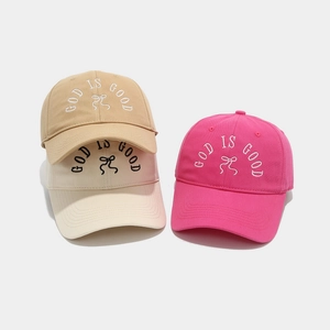 Detailed embroidery on khaki, beige and rose pink cotton baseball caps with bows