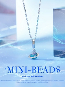 Detail of blue planet charm with sparkling rhinestone ring and S925 silver finish