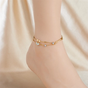 Double-layered gold stainless steel anklet featuring heart charms and small gold beads