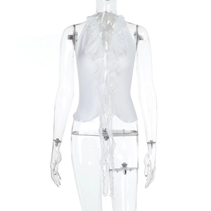 Close-up of a white ruffled halter neck top featuring double-layered frills and a V-neckline