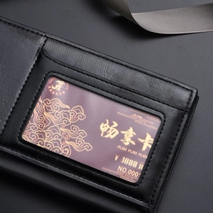 Men's black leather long wallet with transparent ID card slot and premium grain texture