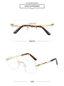 Detailed view of rimless square glasses with gold bridge and tortoiseshell temples