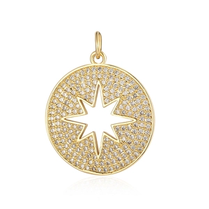 Detail shot of a gold-plated circular pendant with a sparkling zircon starburst motif