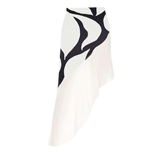 Detail of asymmetrical skirt with black abstract print and layered ruffle hem