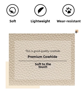 Detailed close-up of premium beige lychee grain cowhide leather texture for women long wallet