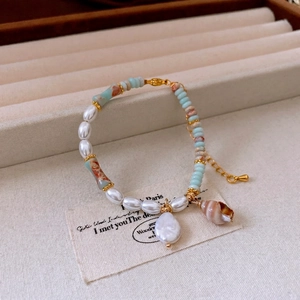 Bohemian freshwater pearl and blue bead necklace with seashell pendant and gold chain