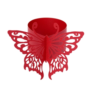 Detail of red paper butterfly napkin ring with intricate laser-cut hollow pattern