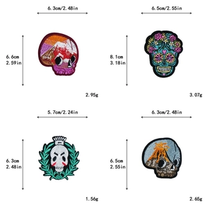 Detailed view of four skull embroidery patches with specific sizes and weights for DIY decor