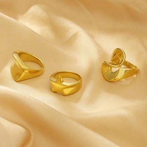 Irregular 18K gold plated geometric ring and star design on champagne silk