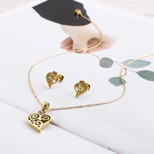 Elegant gold-plated stainless steel jewelry set featuring hollow heart necklace and earrings