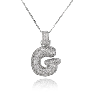 Detailed view of silver letter G pendant with micro-pave cubic zirconia on box chain