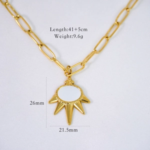 Detail of 14K gold plated sun pendant necklace with dimensions 26mm x 21.5mm