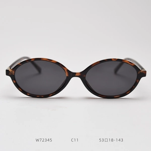 Detail view of tortoiseshell oval sunglasses frames showing the W72345 C11 model sizing