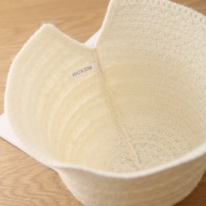 Winter knitted cream bucket hat for women with thick warm spiral weave texture