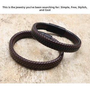 Detail of woven leather bracelets with black matte magnetic clasp on stone texture