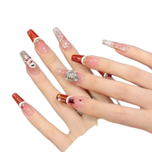 Luxurious Christmas press-on nails with 3D trees, snowflakes, and sparkling rhinestones