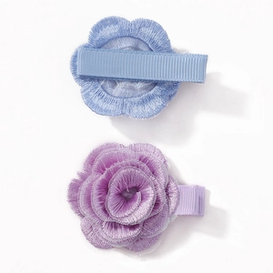 Pair of handmade floral embroidery hair clips in soft blue and purple for girls
