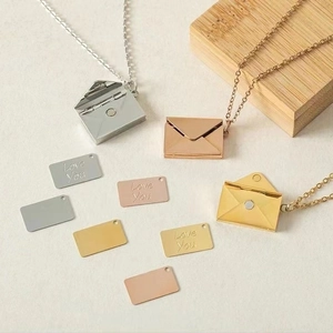 Three envelope pendant necklaces in silver rose gold and gold with Love You engraving
