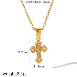 Detailed specs of gold cross necklace with clear stones, dimensions 18.2mm by 11.5mm