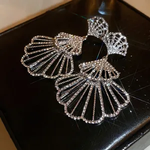 Elegant fan-shaped drop earrings with full-pave sparkling crystals in silver finish