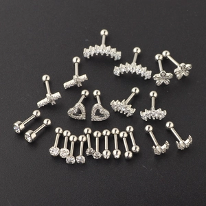 Detail view of silver stainless steel cartilage earrings set with cubic zirconia stones