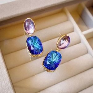 Vintage geometric oval earrings with purple and blue gems in gold-plated settings