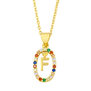 Detailed close-up of gold-plated necklace with oval pendant and letter F in multi-color zircon